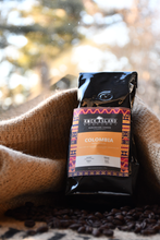 Load image into Gallery viewer, Rock Island Roastery coffee. Coffee bag for Colombia beans.
